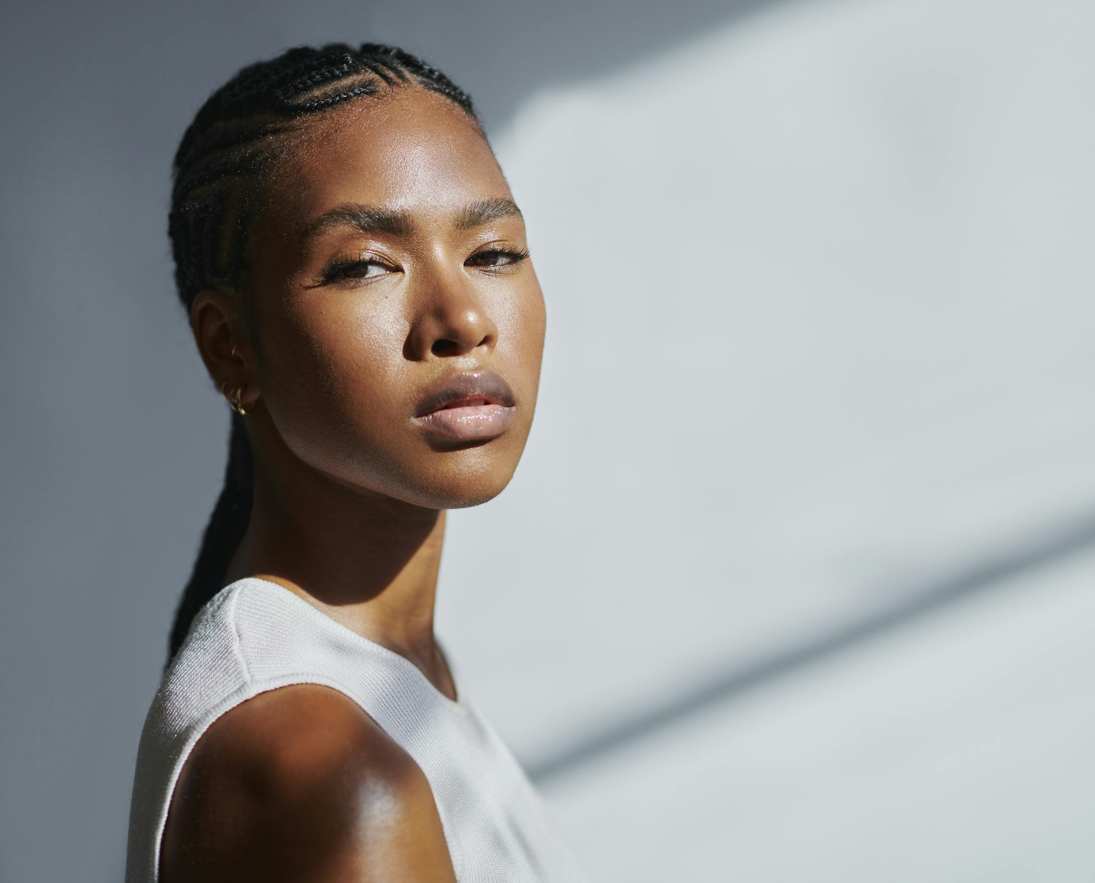 Woman with light shining on her face