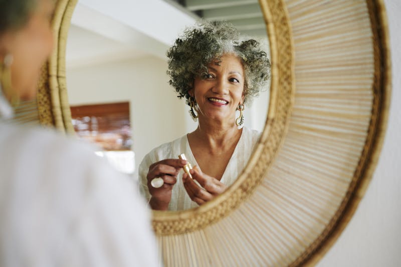 Woman looking in the mirror