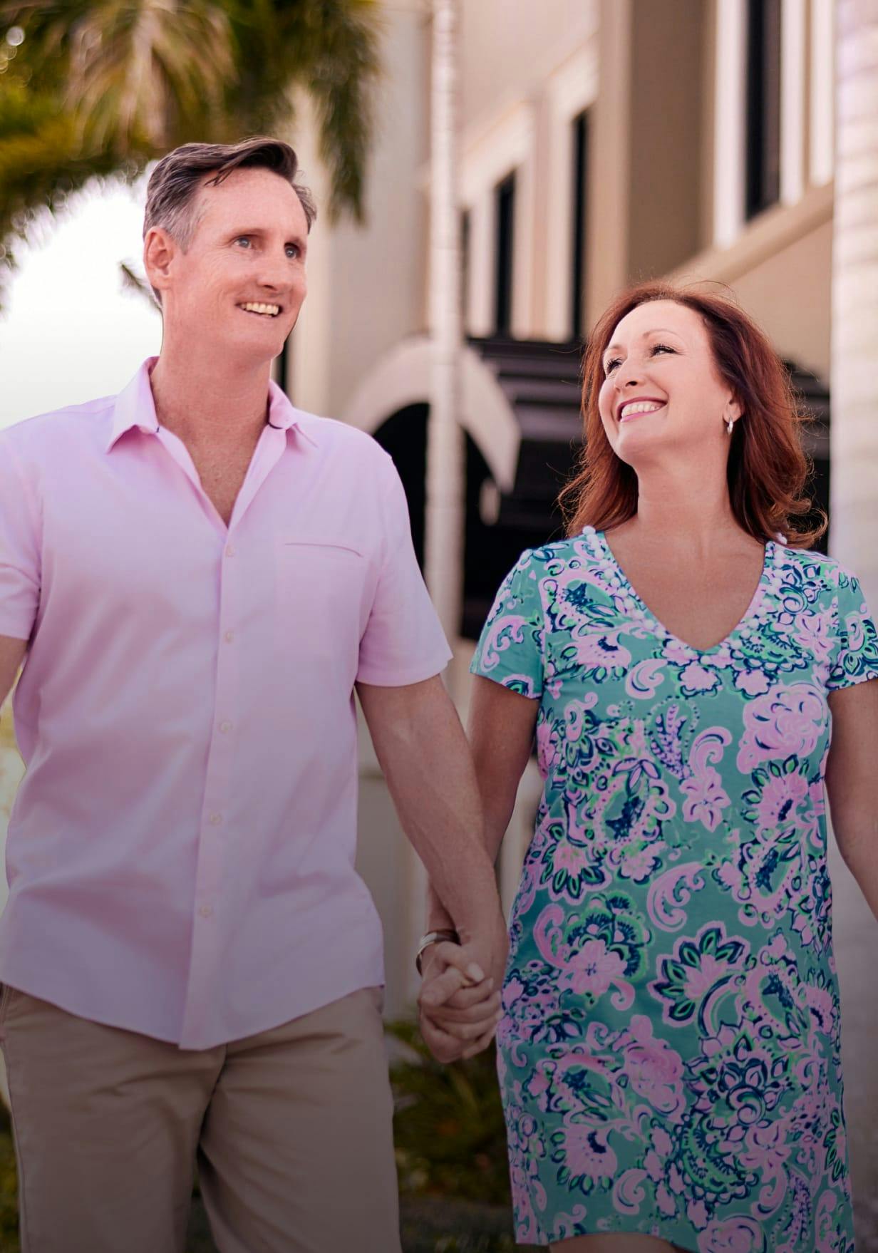 Traveling patients walking and holding hands.