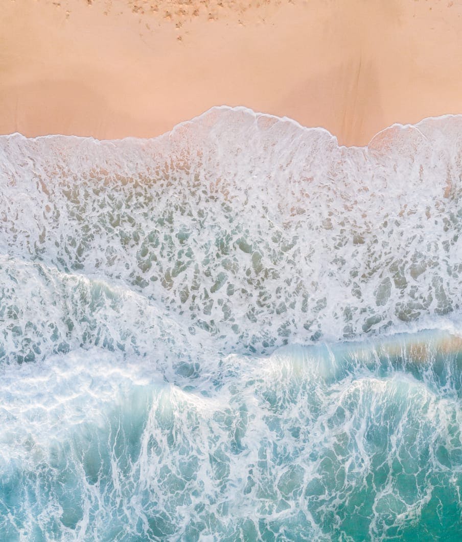 ocean waves crashing on beach
