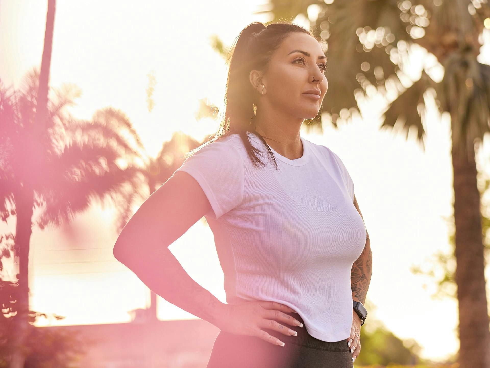 Woman in white shirt with her hair up