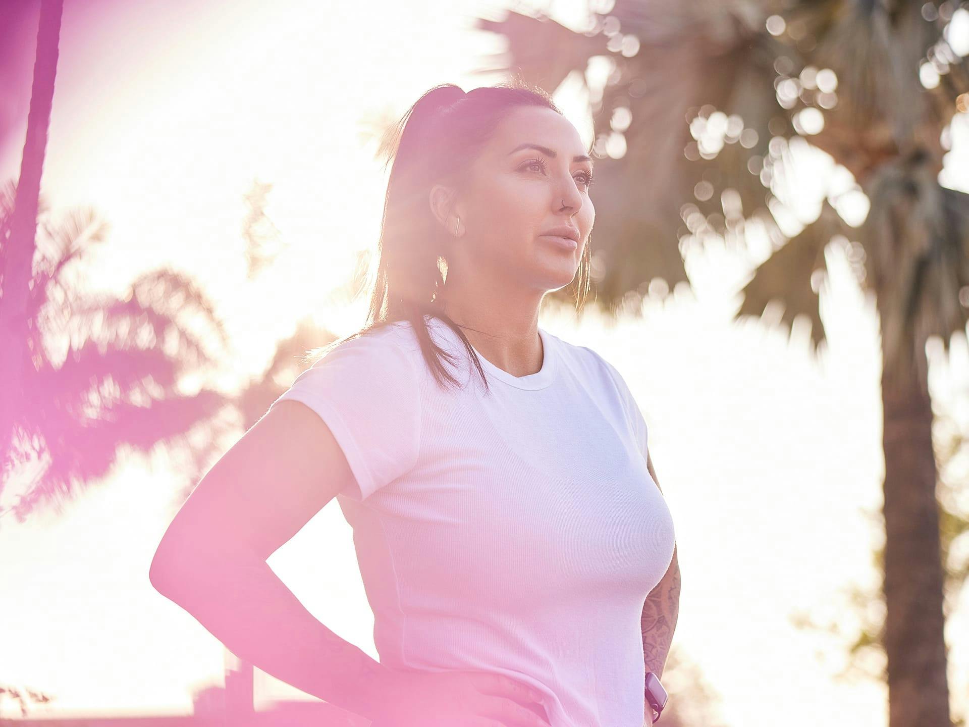 Woman in a white shirt with her hair up