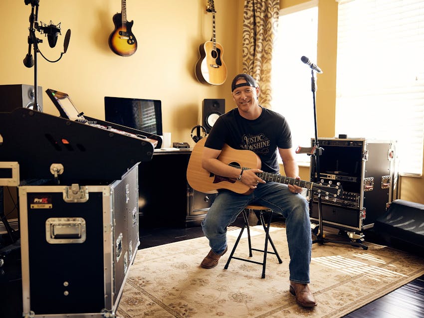 William Vinyard playing guitar