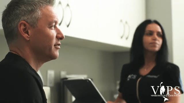 man and woman looking off to the right of camera