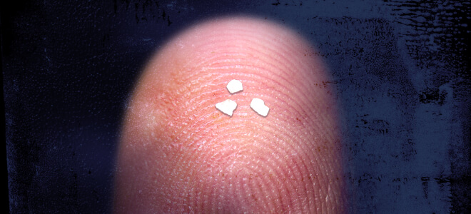 Grains of Fentanyl on a person's finger.