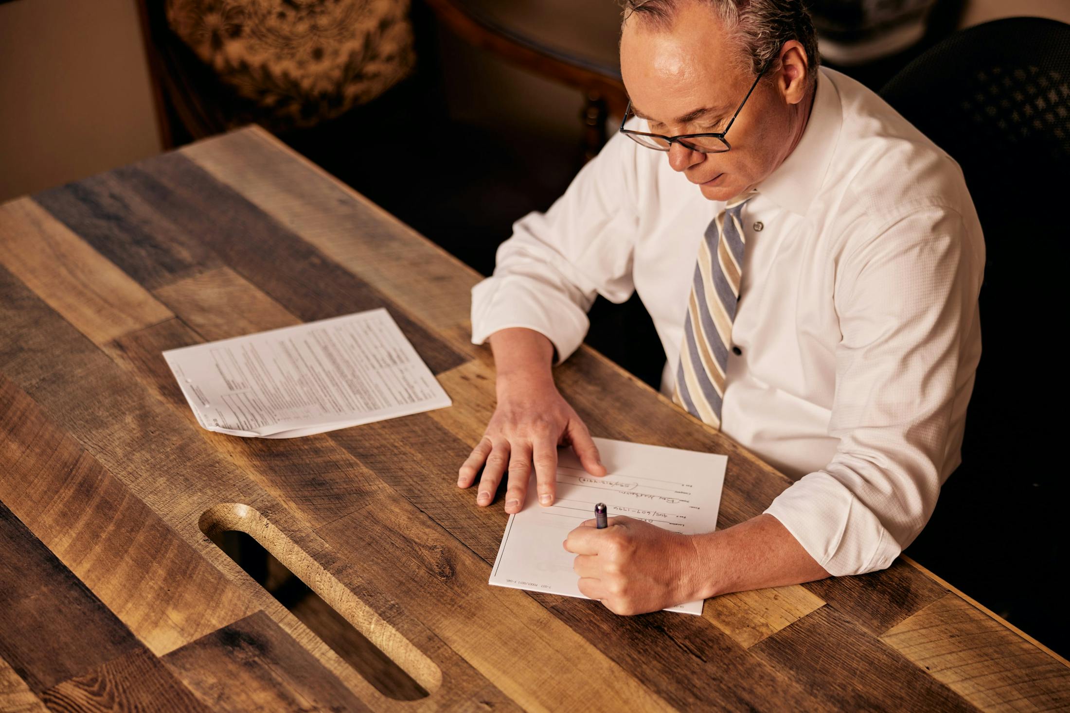 Jack Stipe working on paperwork