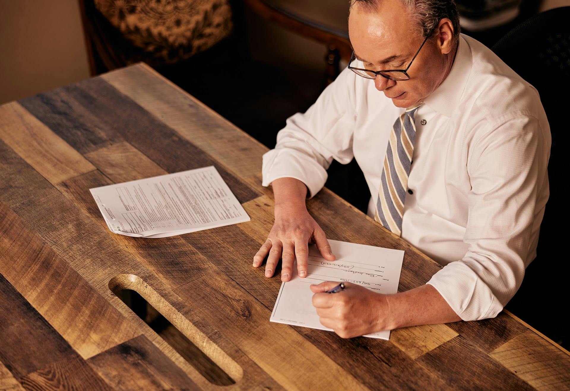 Jack Stipe working on paperwork