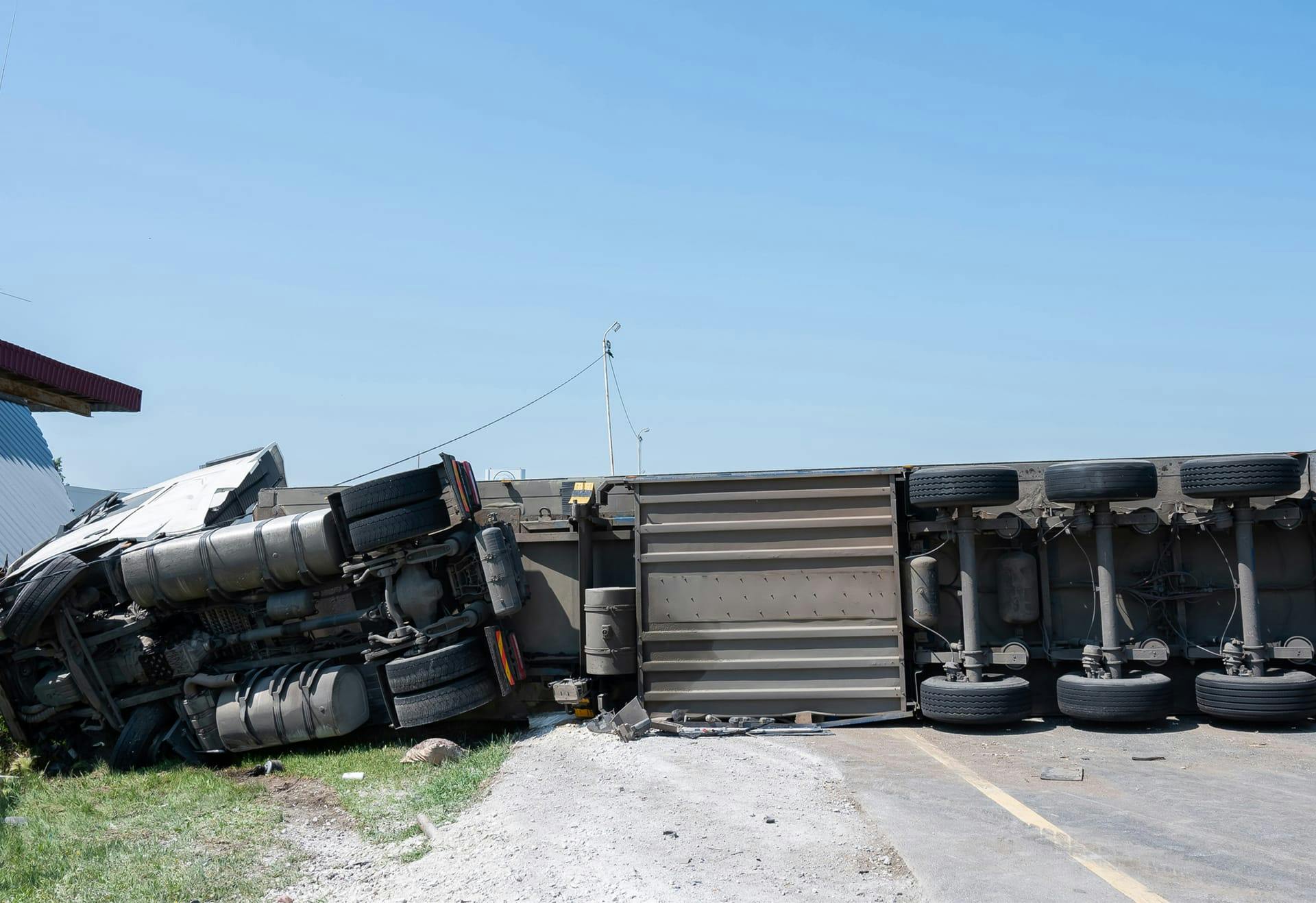 semi truck on its side