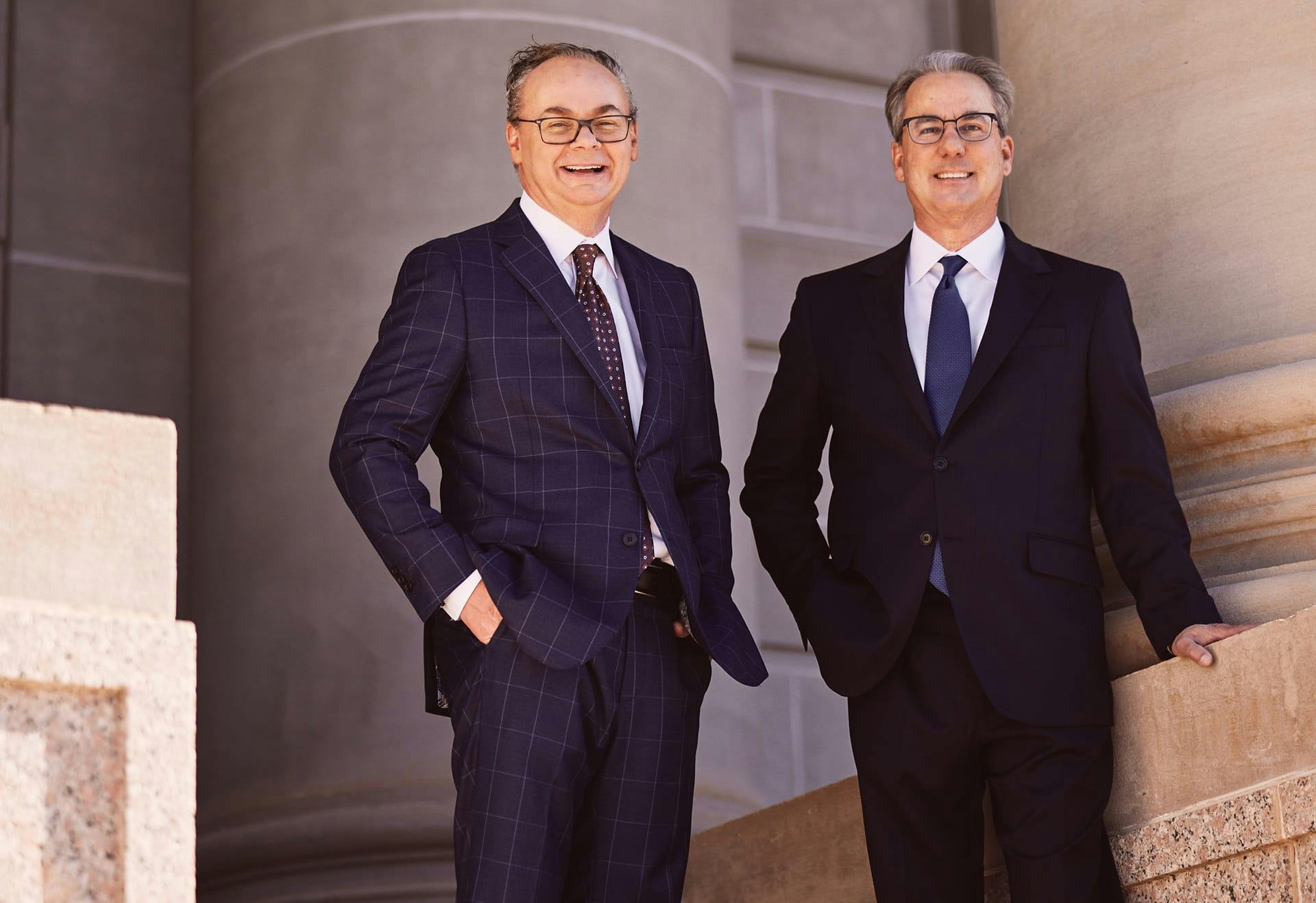 Attorneys Stipe & Belote standing in front of the court house.