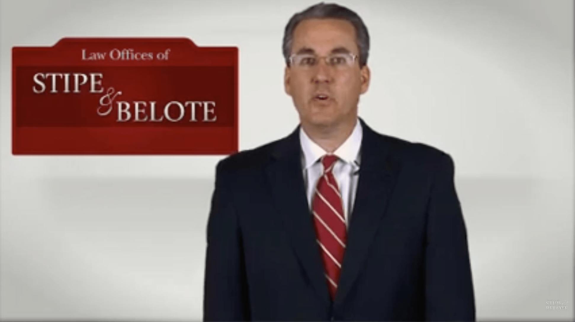 Belote, attorney, speaking in a youtube video