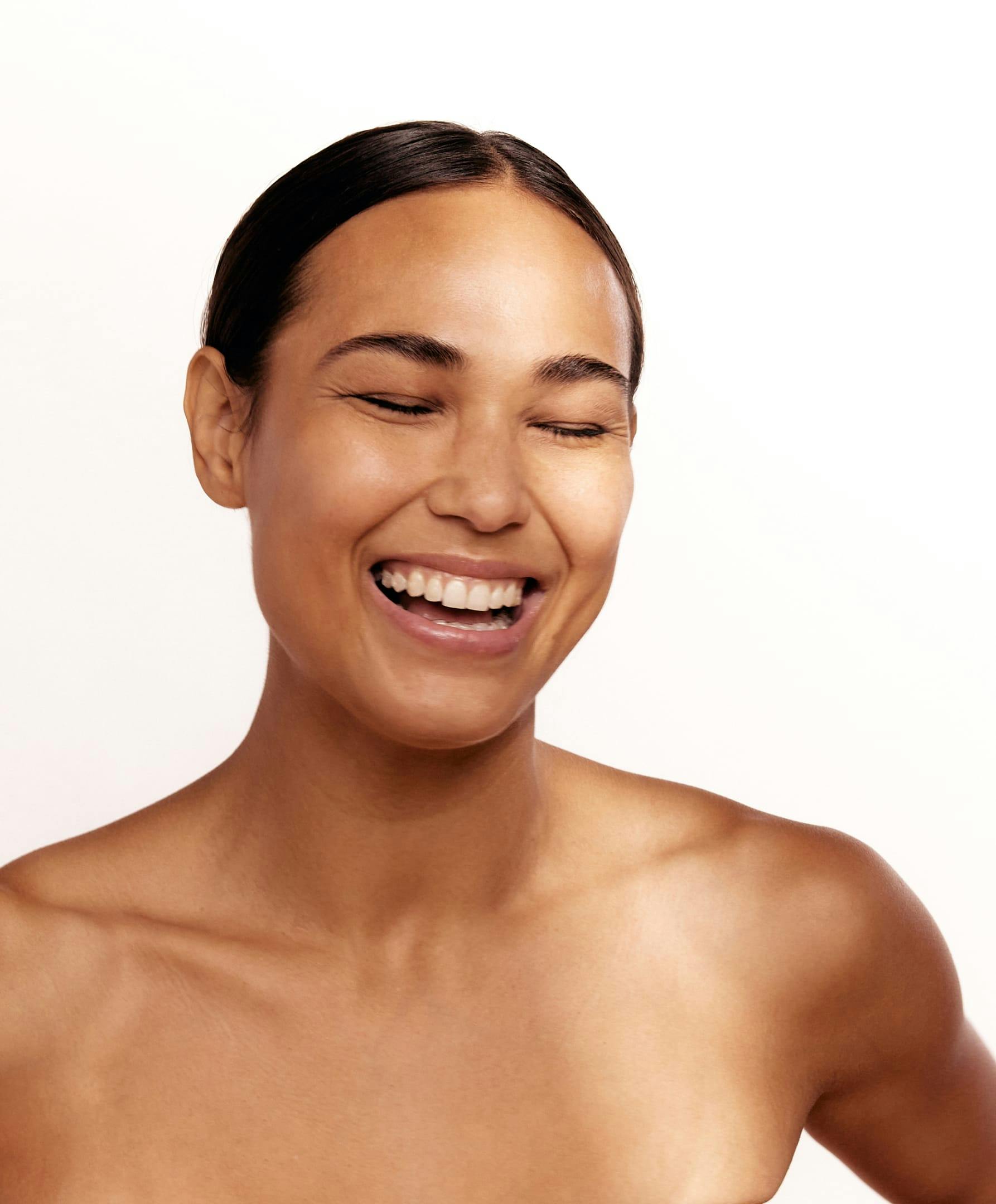 Woman Laughing  With Great Skin