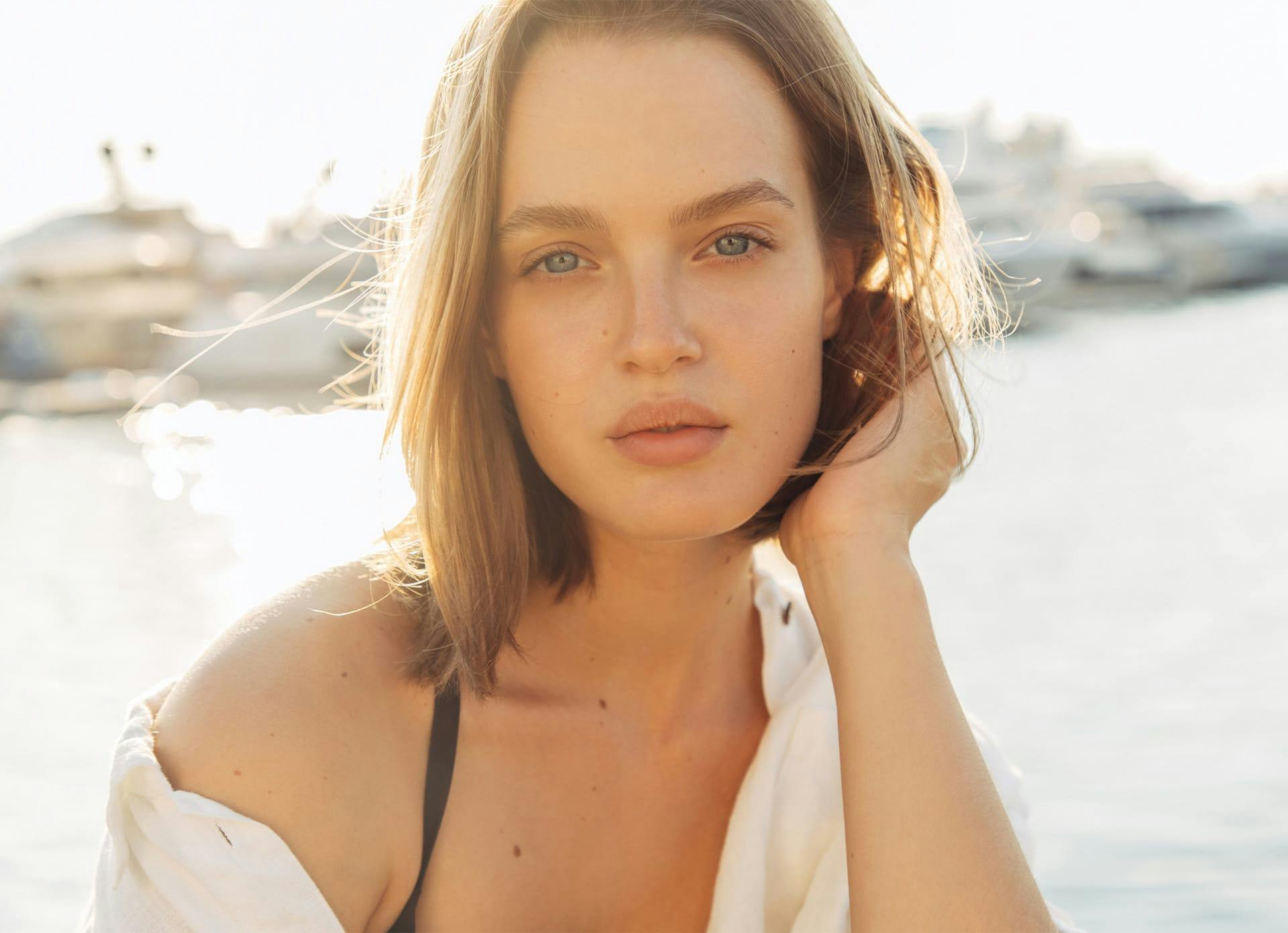 Beautiful Woman Showing Face With Smooth Skin - Acne Banner
