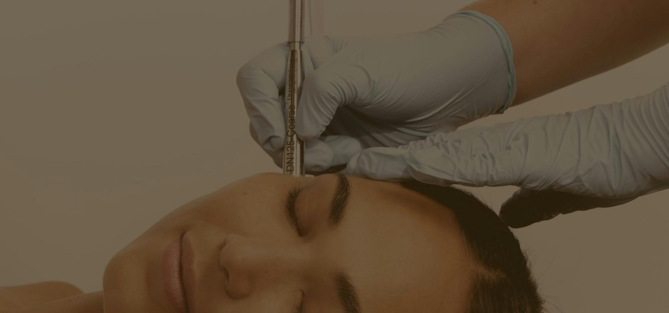 Contact Banner - Woman Getting DiamondTouch Treatment