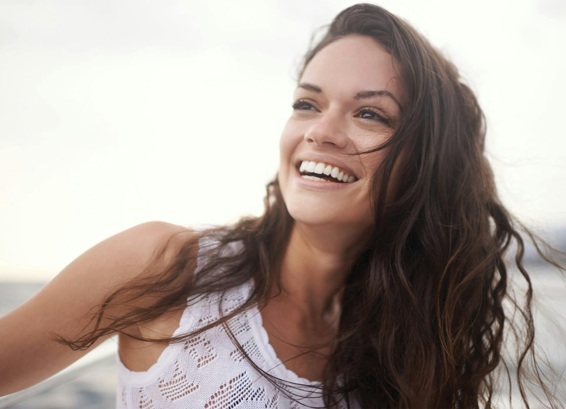 Woman Smiling - Enlarge Pores Banner