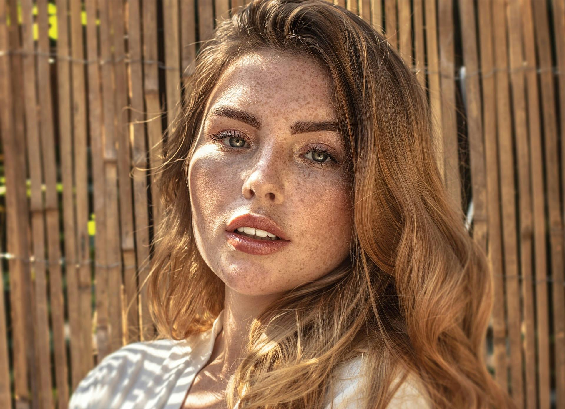 Woman With a Freckled Face and Lots of Skin Tone and Vibrancy Banner