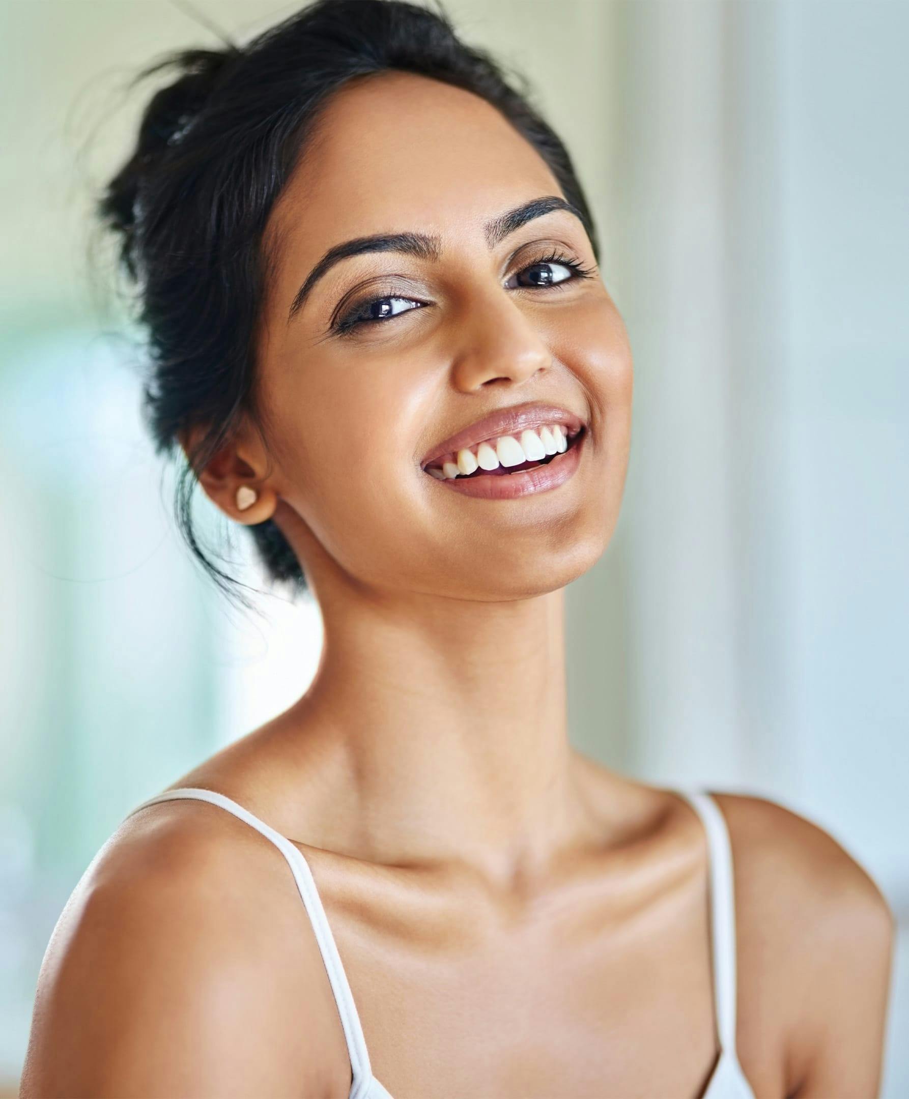 Woman Smiling with Great Skin - Enlarge Pores Banner