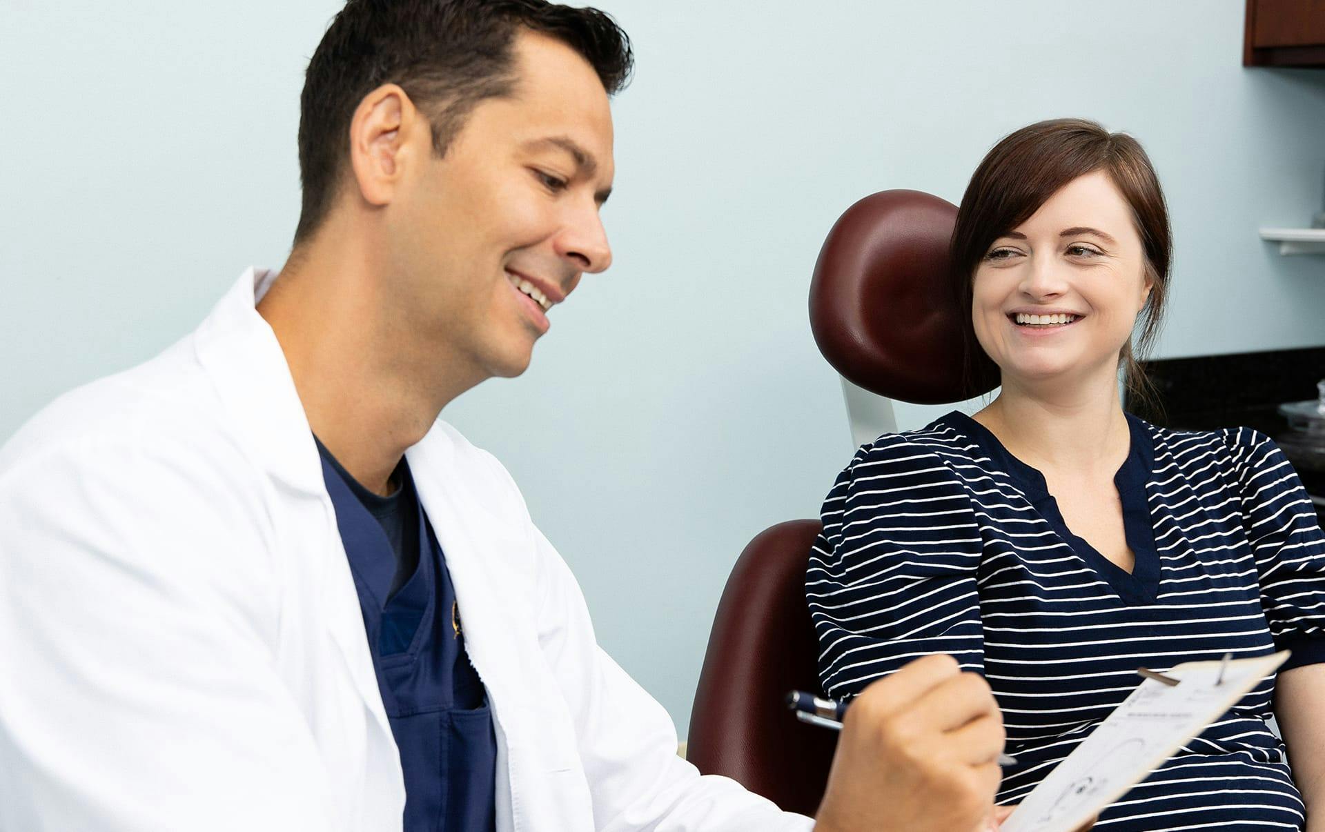 Doctor going over chart with patient