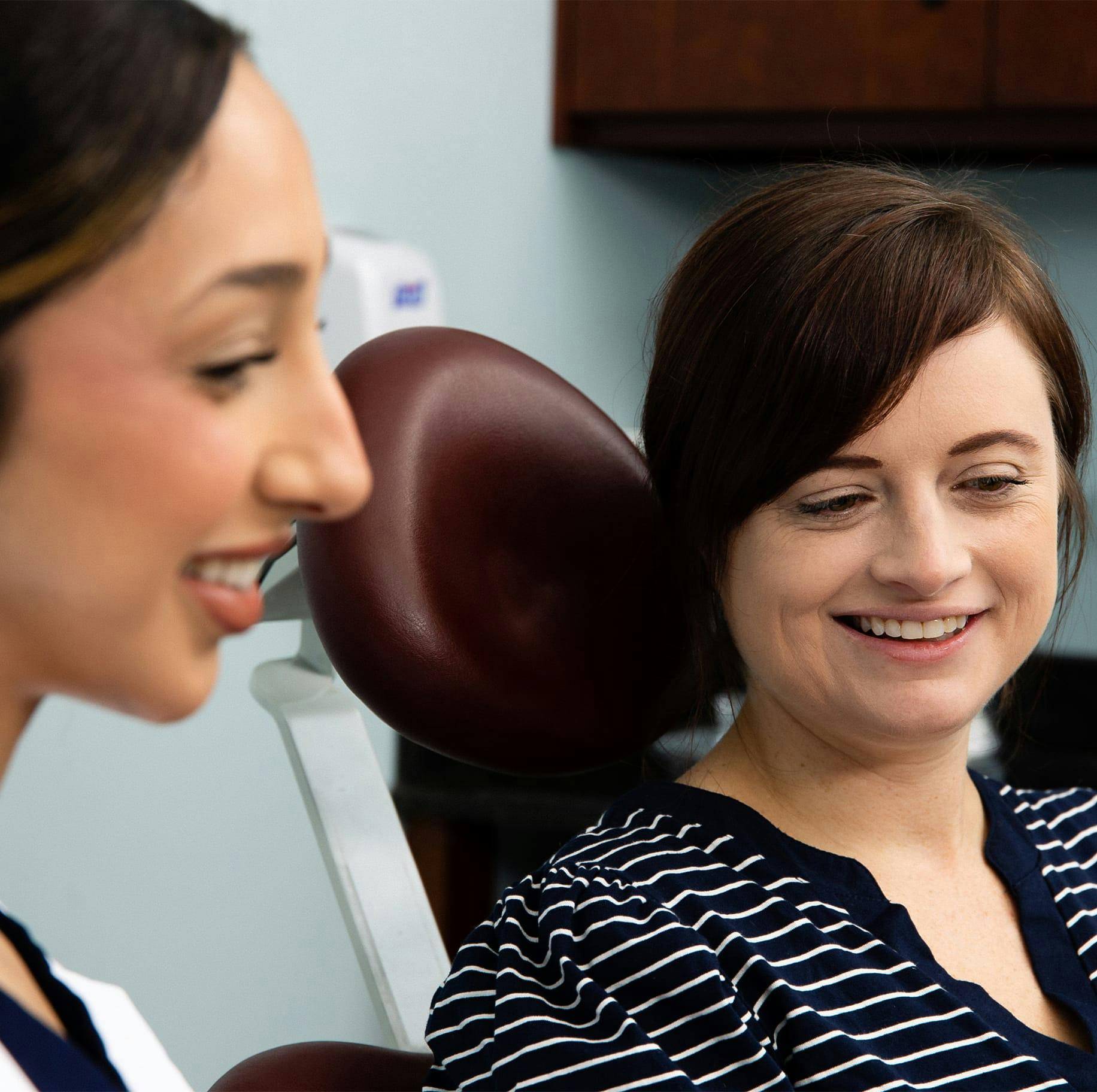 woman and nurse smiling