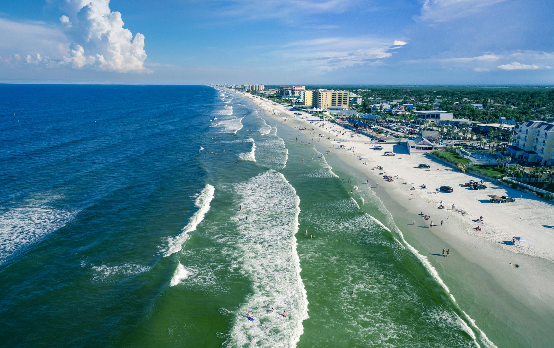 aerial photo of waves on beach