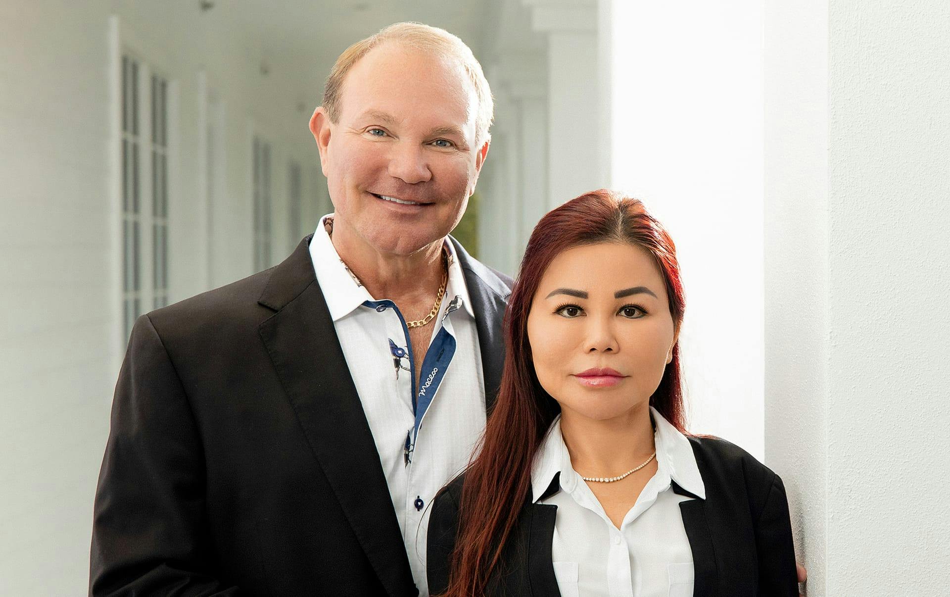 Dr. James Young & woman with long red hair