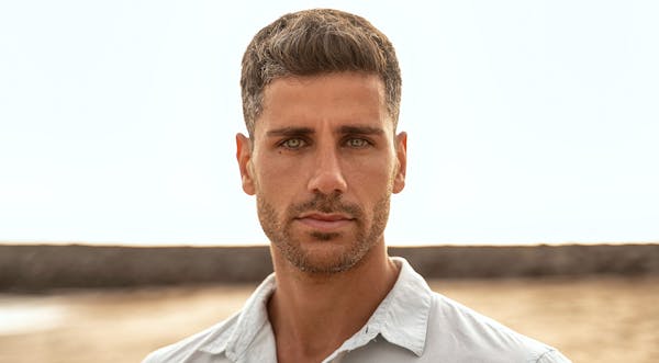 Man with a collared shirt on