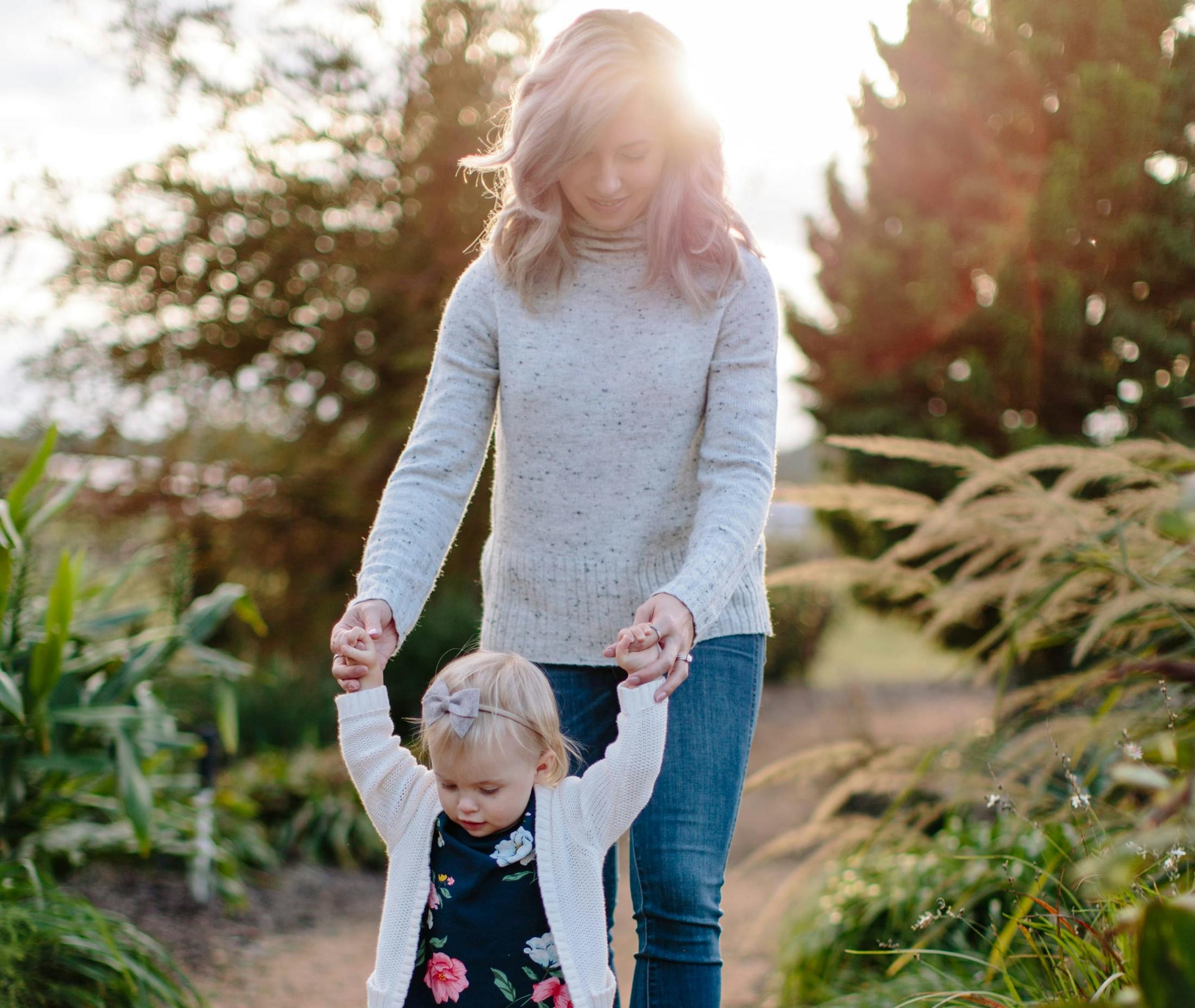Woman walking with child