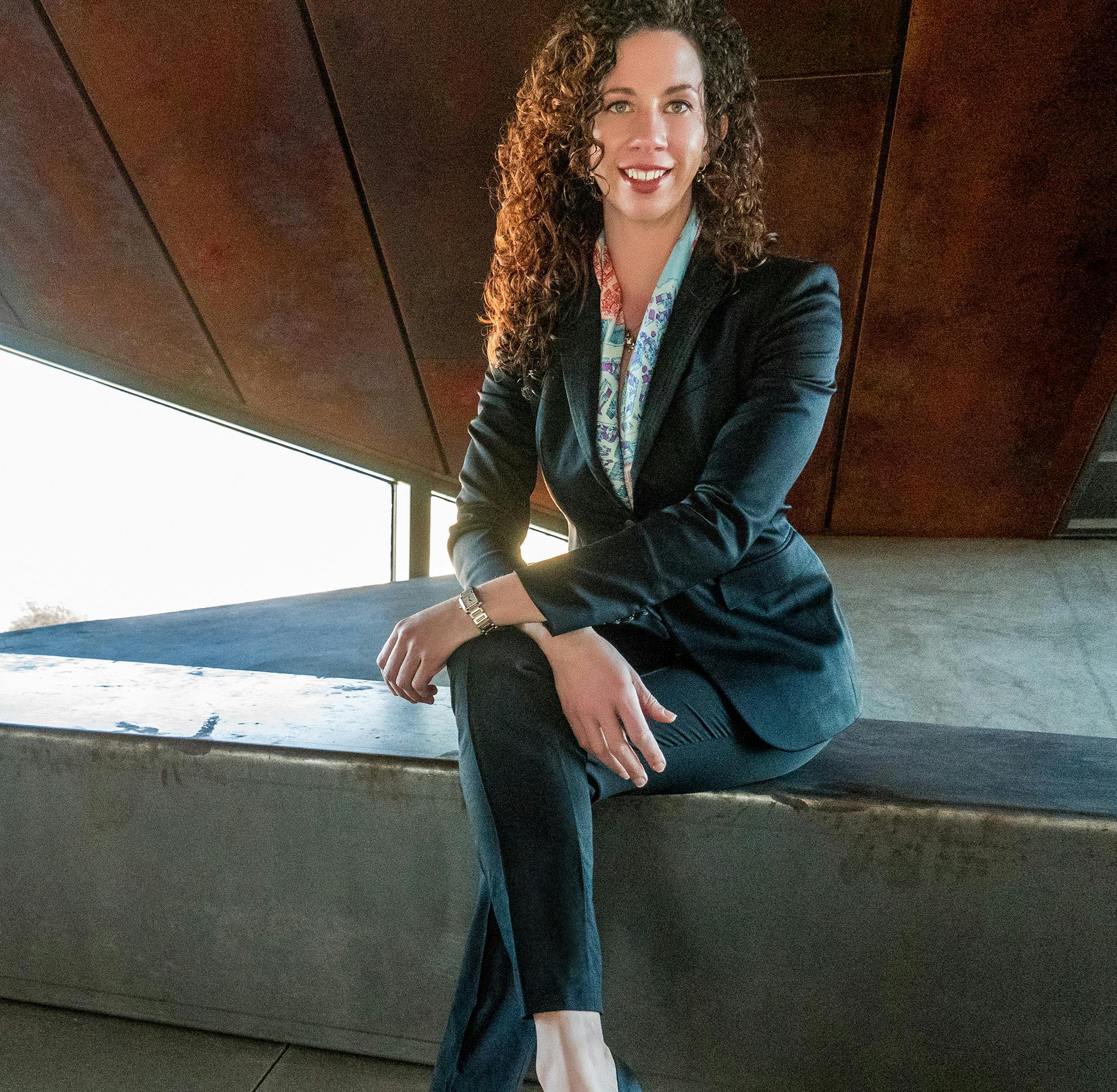Dr. Koonce sitting on a bench
