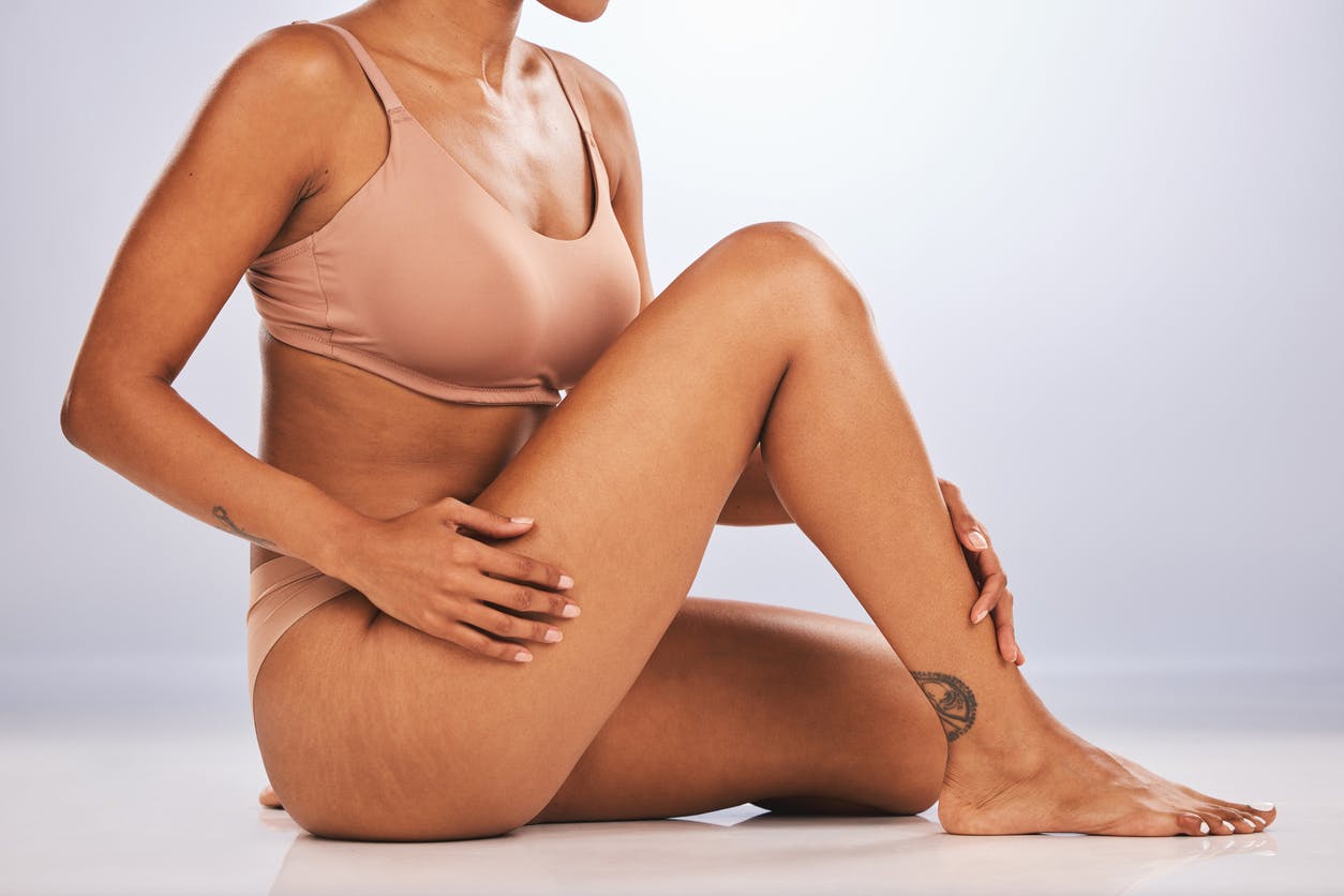 woman in light pink workout set