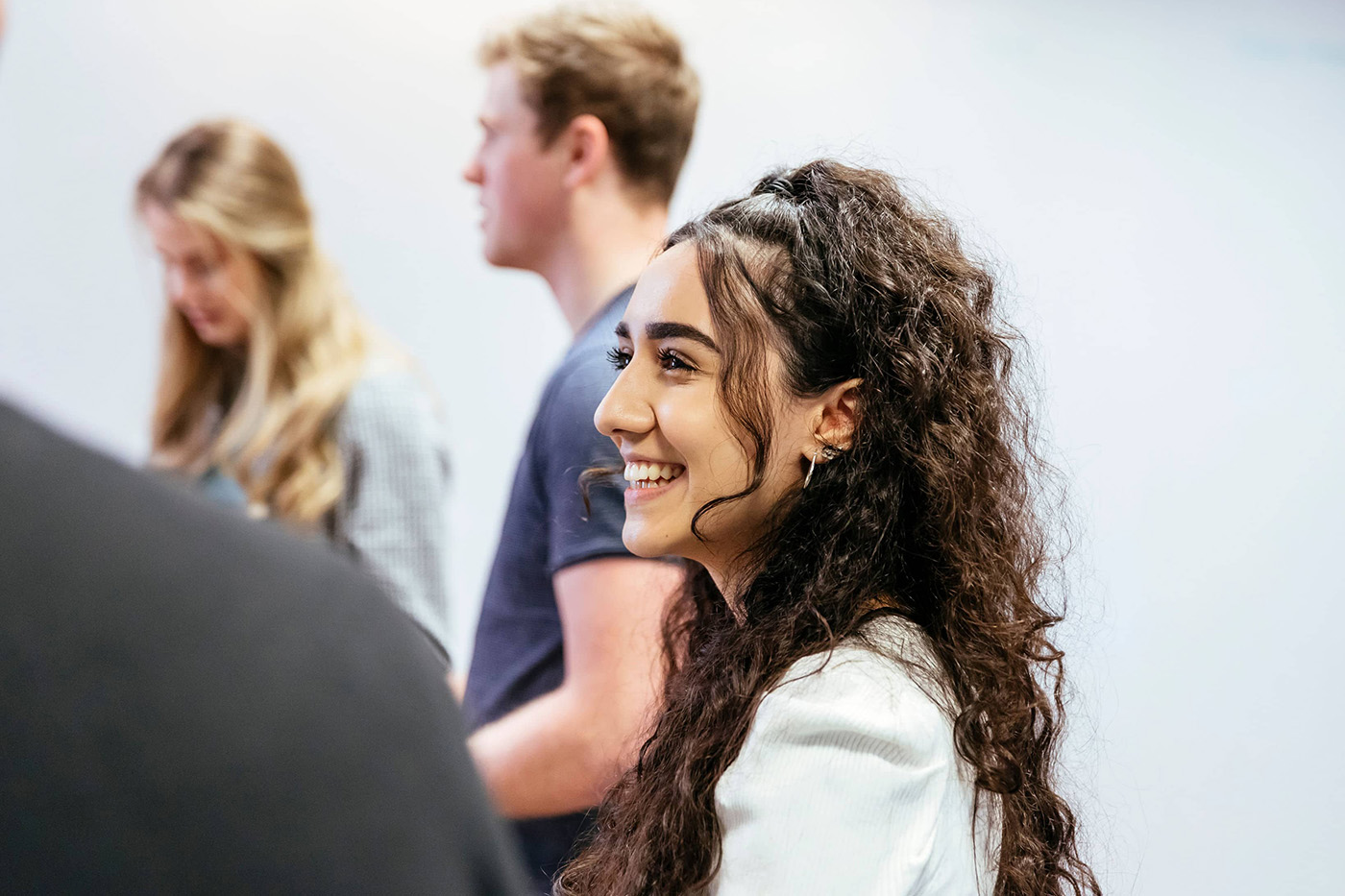 Female colleague smiling during a meeting