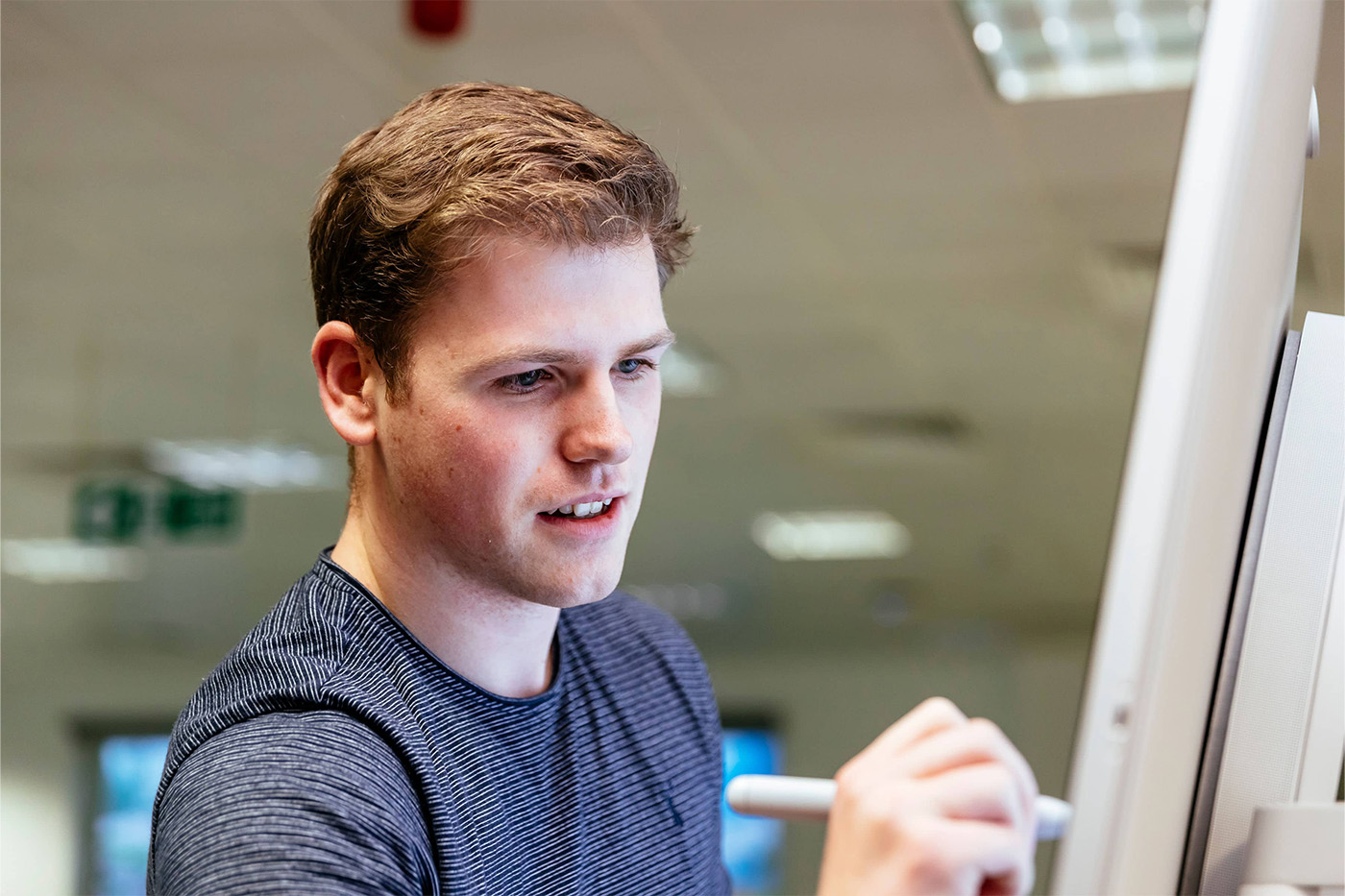 Man working on a whiteboard