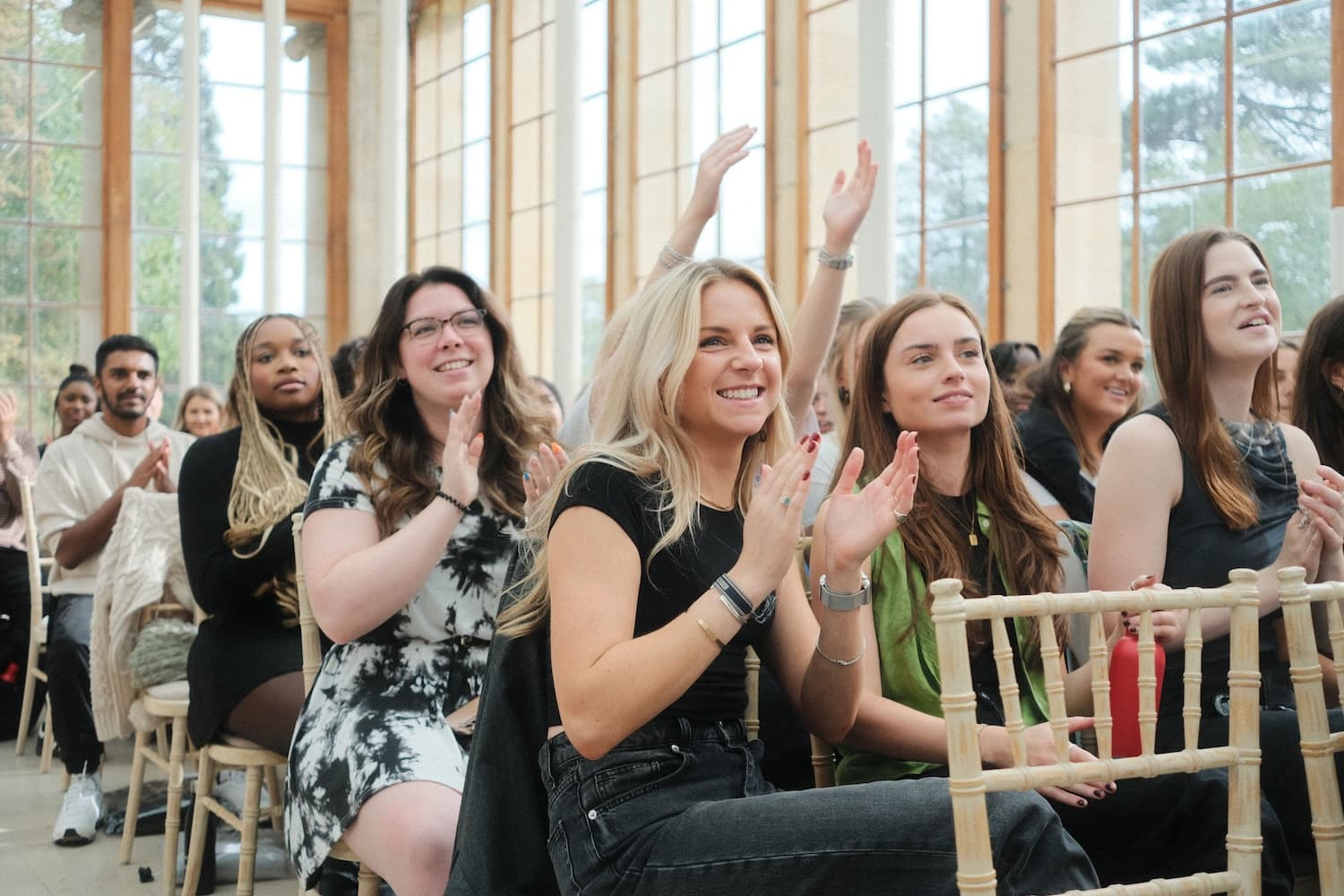 Lauren and team clapping