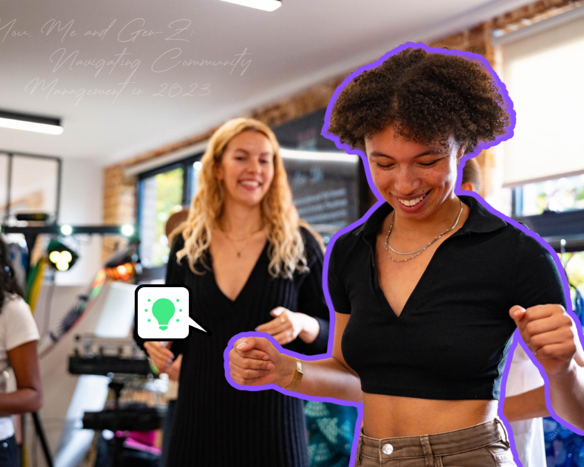 Young Gen-Z woman laughing with colleagues