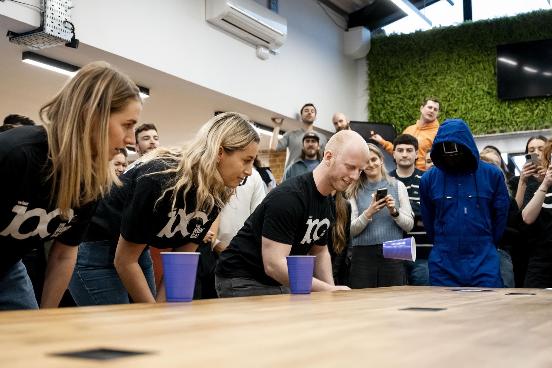 Flipcup game being played by group of people