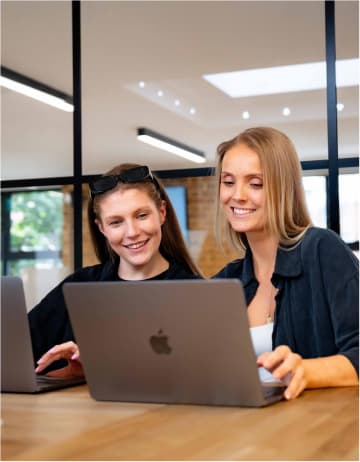 two girls at desk