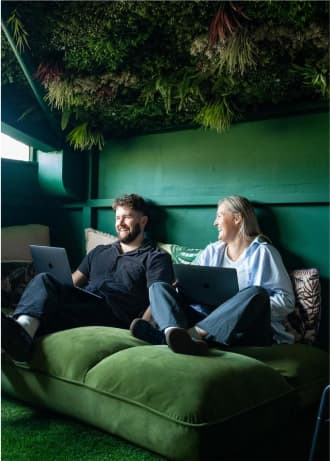 girl and guy in indoor rainforest