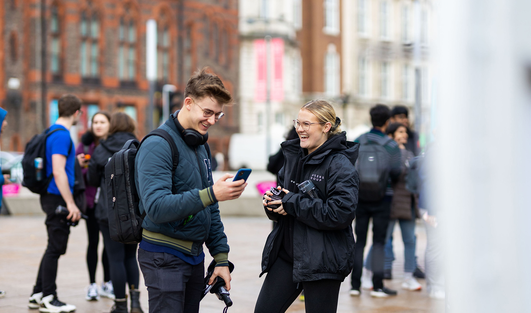 A Frasers Group promoter laughing with a student