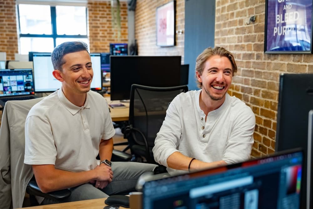 Two young guys at work