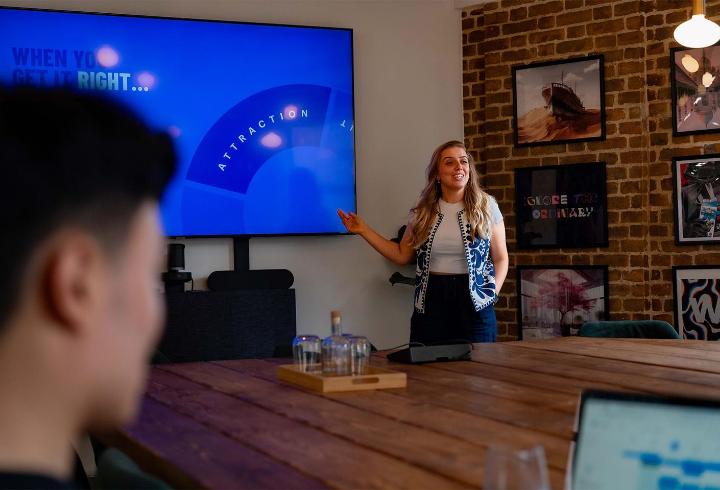 Image of blonde woman delivering a presentation on early talent attraction