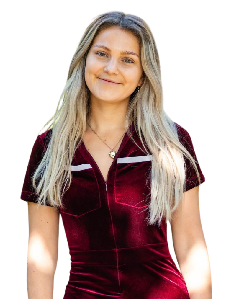 Portrait of young blonde woman in red velvet top