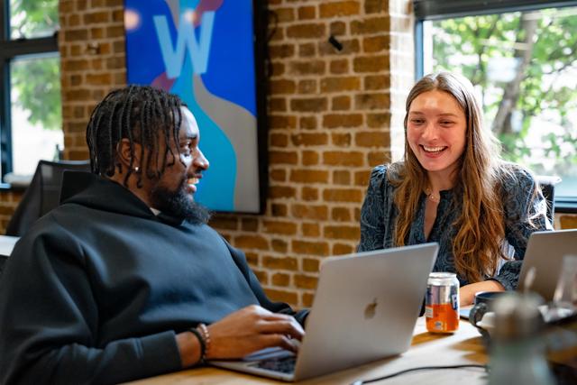 Photo of two colleagues