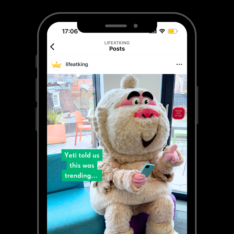 Instagram post of King’s Yeti mascot using a smartphone.