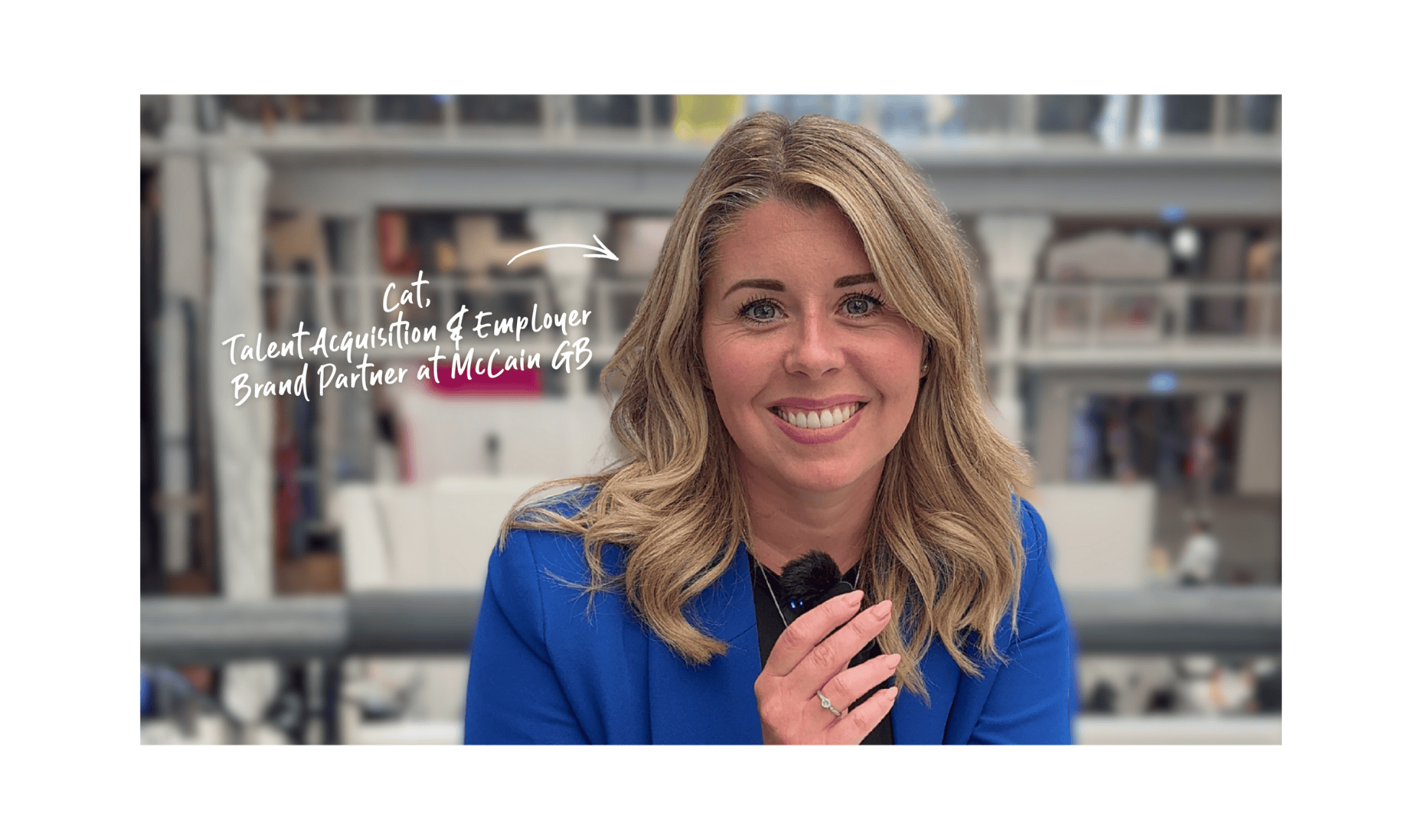 Smiling woman in a blue blazer holding a microphone, sitting indoors with a blurred background. Text highlights her role in talent acquisition at McCain GB.