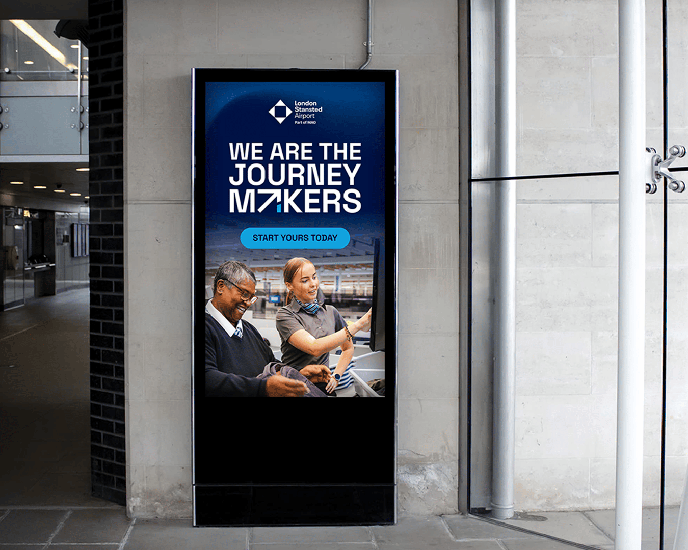 Digital billboard in an airport reads "We Are the Journey Makers" with two smiling airport staff, conveying teamwork. A "Start Yours Today" button is visible.
