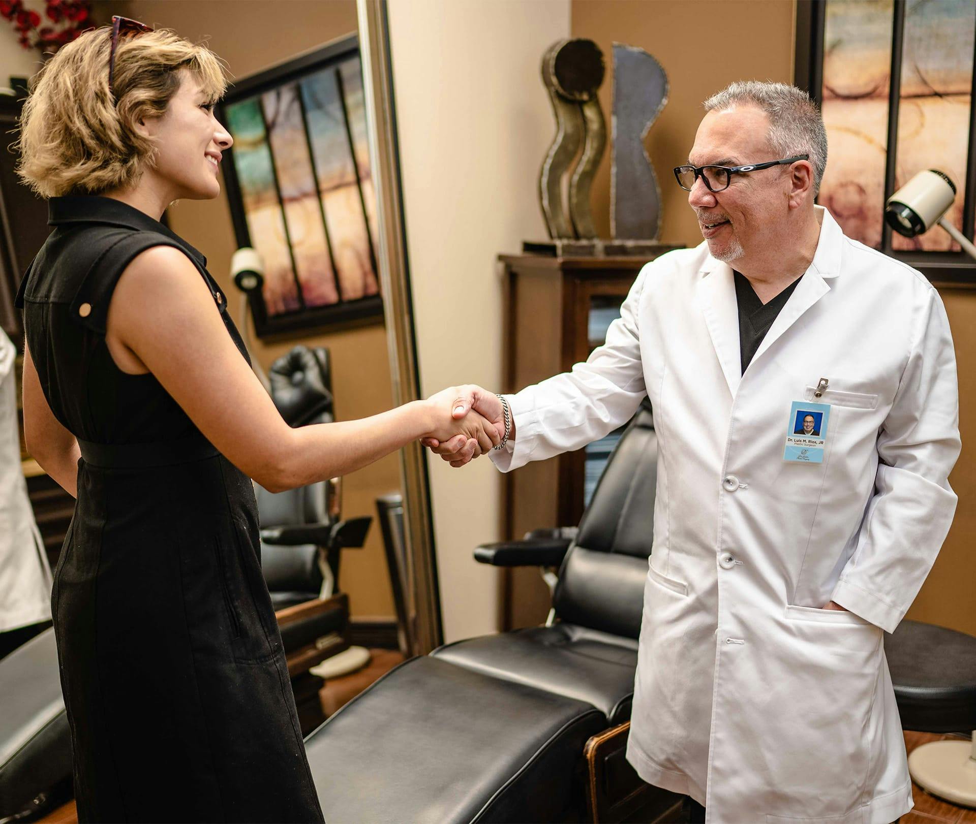 doctor and client shaking hands