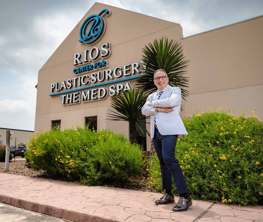 doctor standing in front of building
