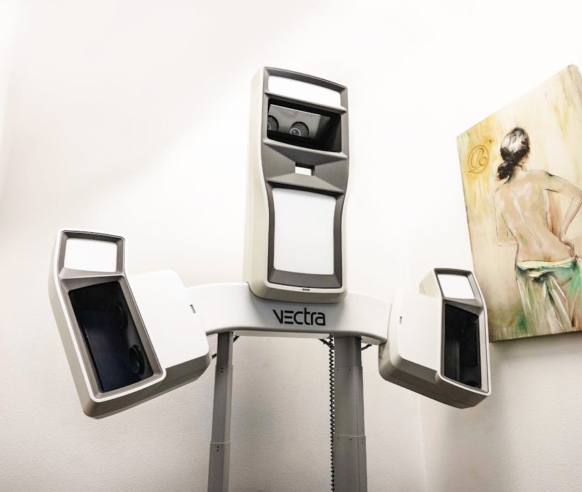 doctor standing next to procedure table