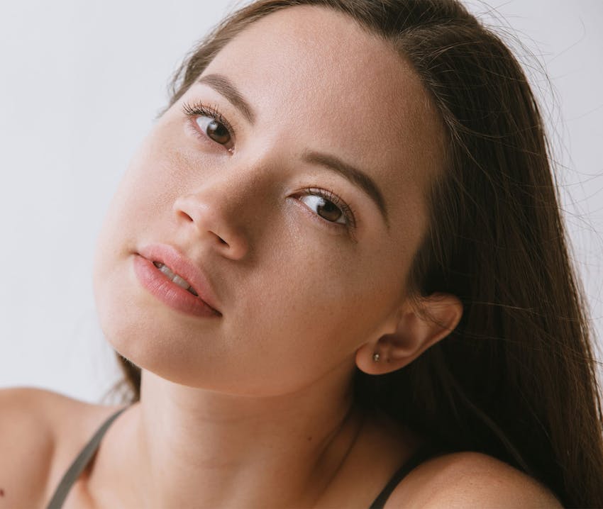 woman close up with her head tilted