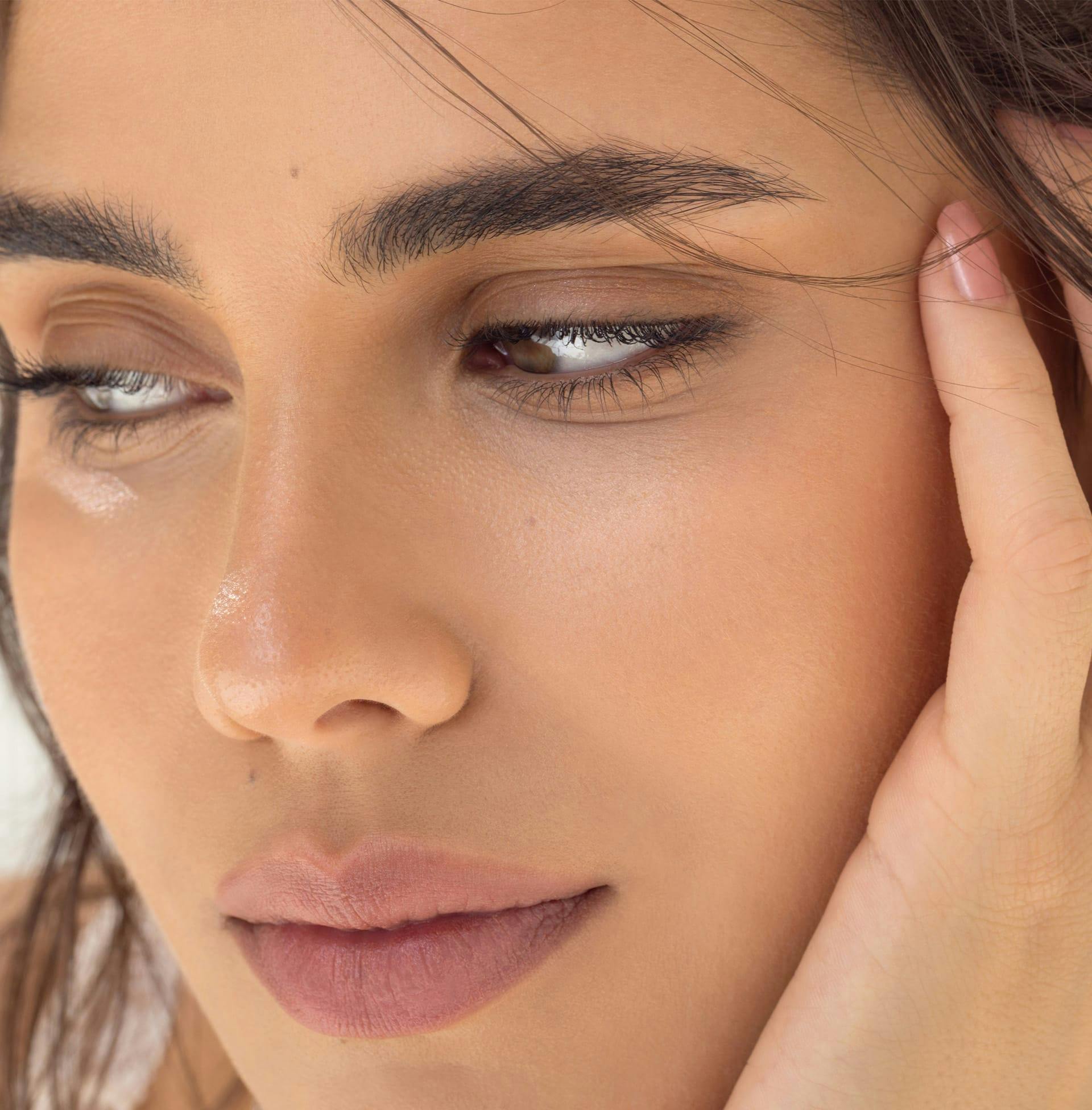 close up of woman looking away from the camera