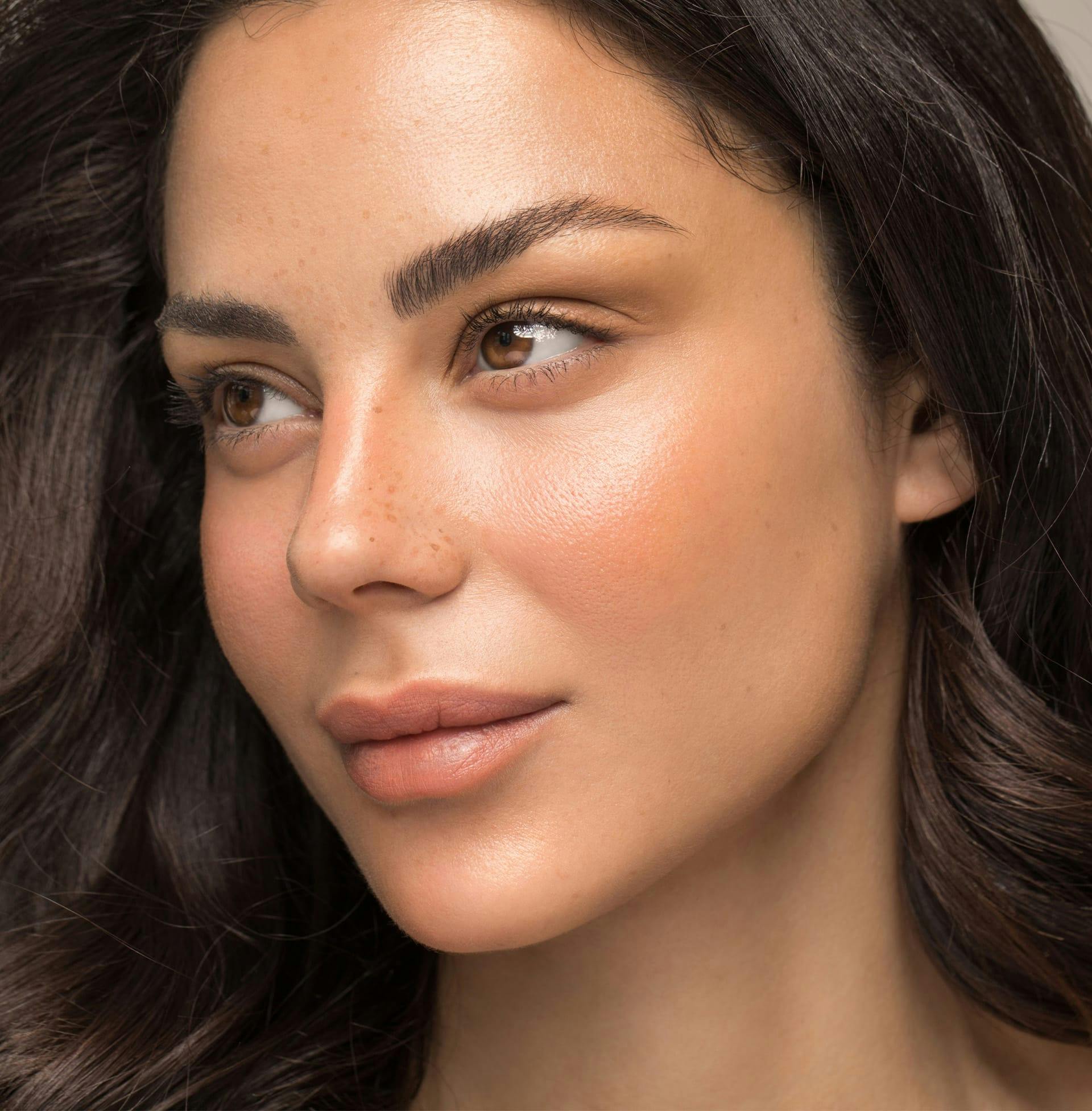 woman looking off to the side of the camera