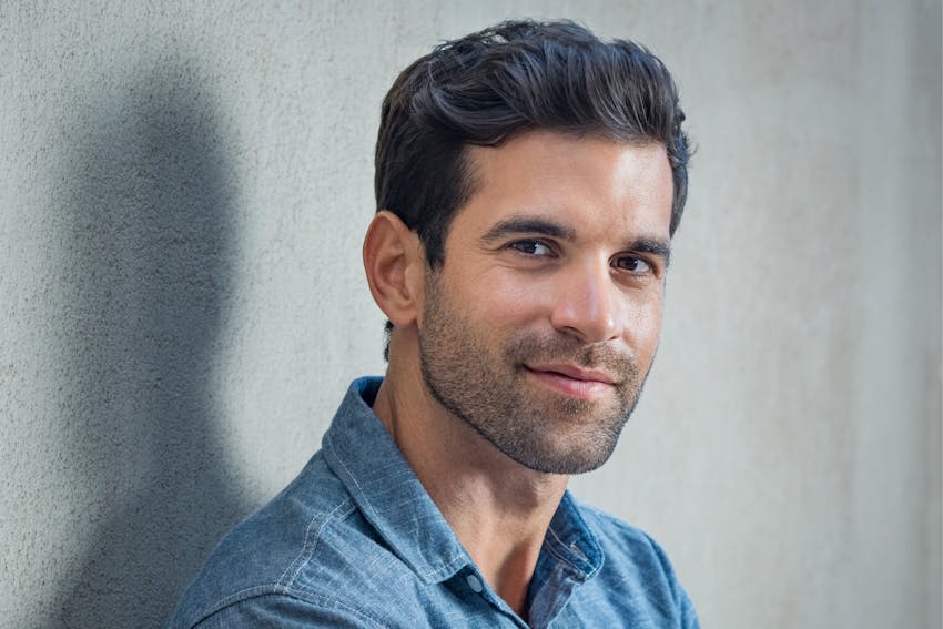 man in white tank top